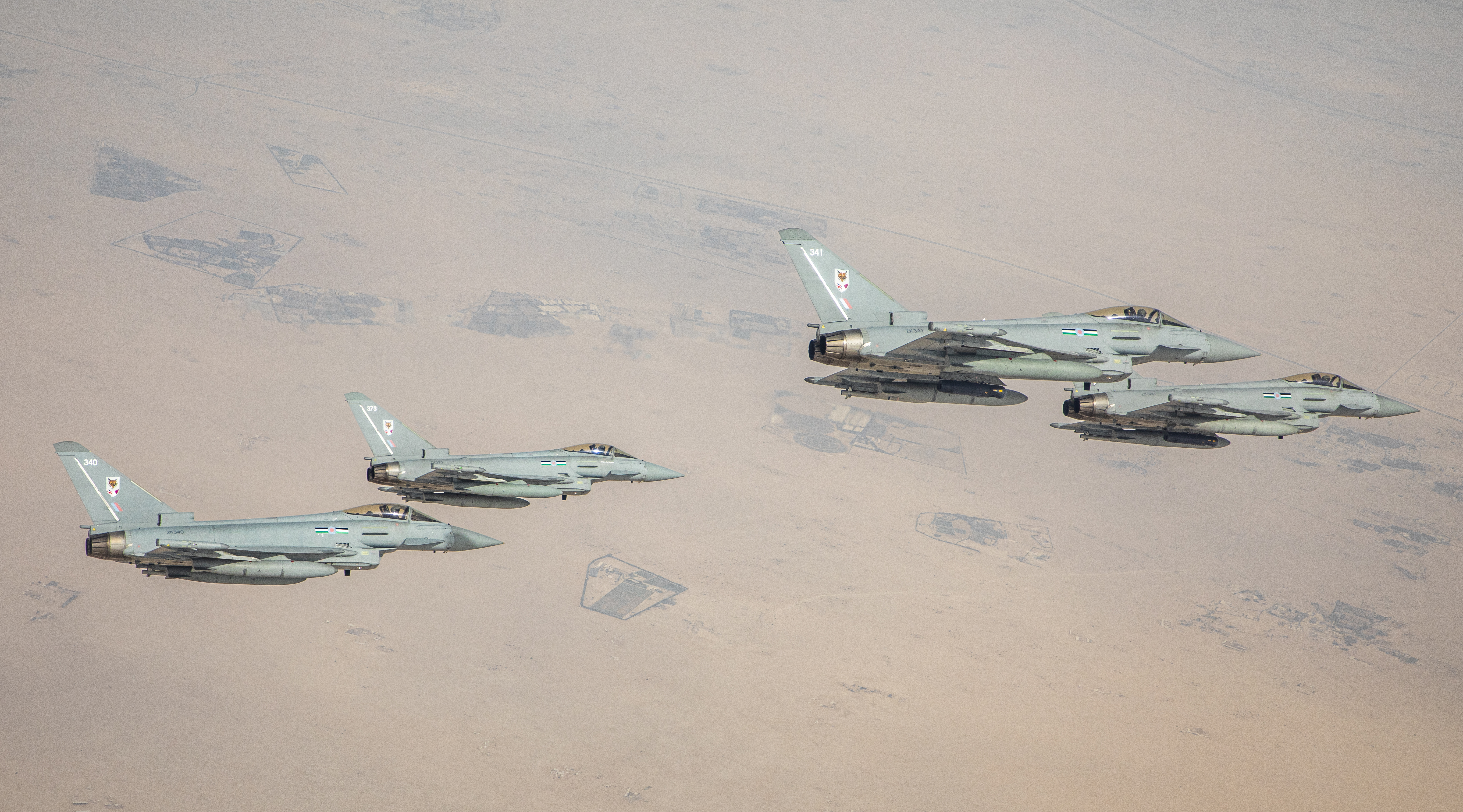 Image shows RAF Typhoons flying in formation.